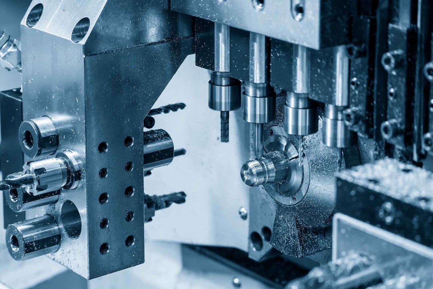 stock photo the operation of multi tasking cnc lathe machine swiss type making the pipe connector parts the hi 1827521192 - Leanplans-Custom Manufacturing On-Demand stock photo the operation of multi tasking cnc lathe machine swiss type making the pipe connector parts the hi 1827521192